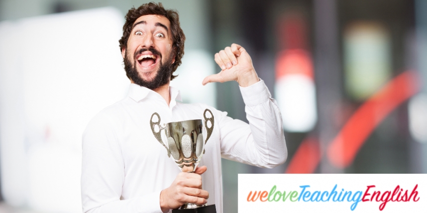 Happy man with a trophy