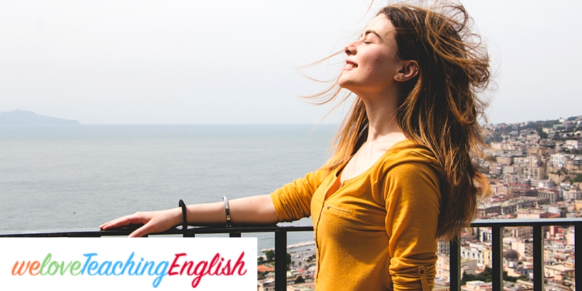 Woman enjoying breath of wind